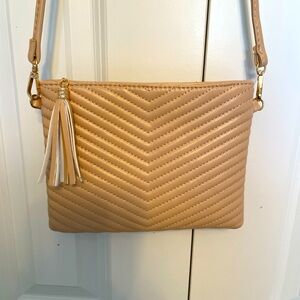 Never used!!  Taupe handbag / wristlet. 6 X 8 inches. Quilted.